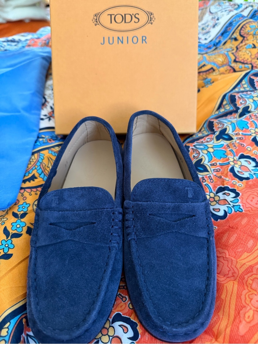 Tod’s junior blue suede moccasin